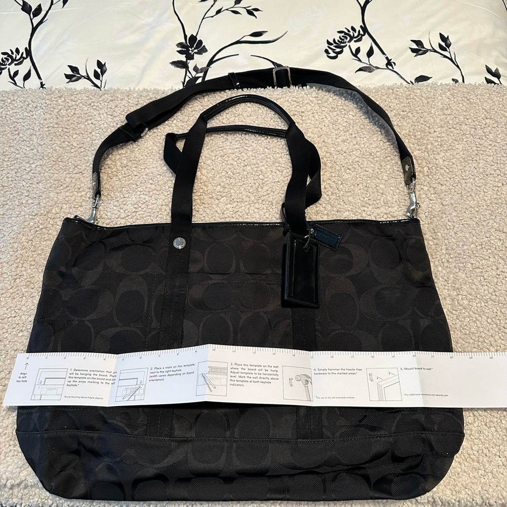 Coach Signature extra large overnight bag.